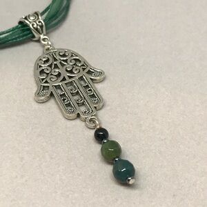 Fatima hand / Hamsa filigree necklace. Ribbon choker with green gem beads